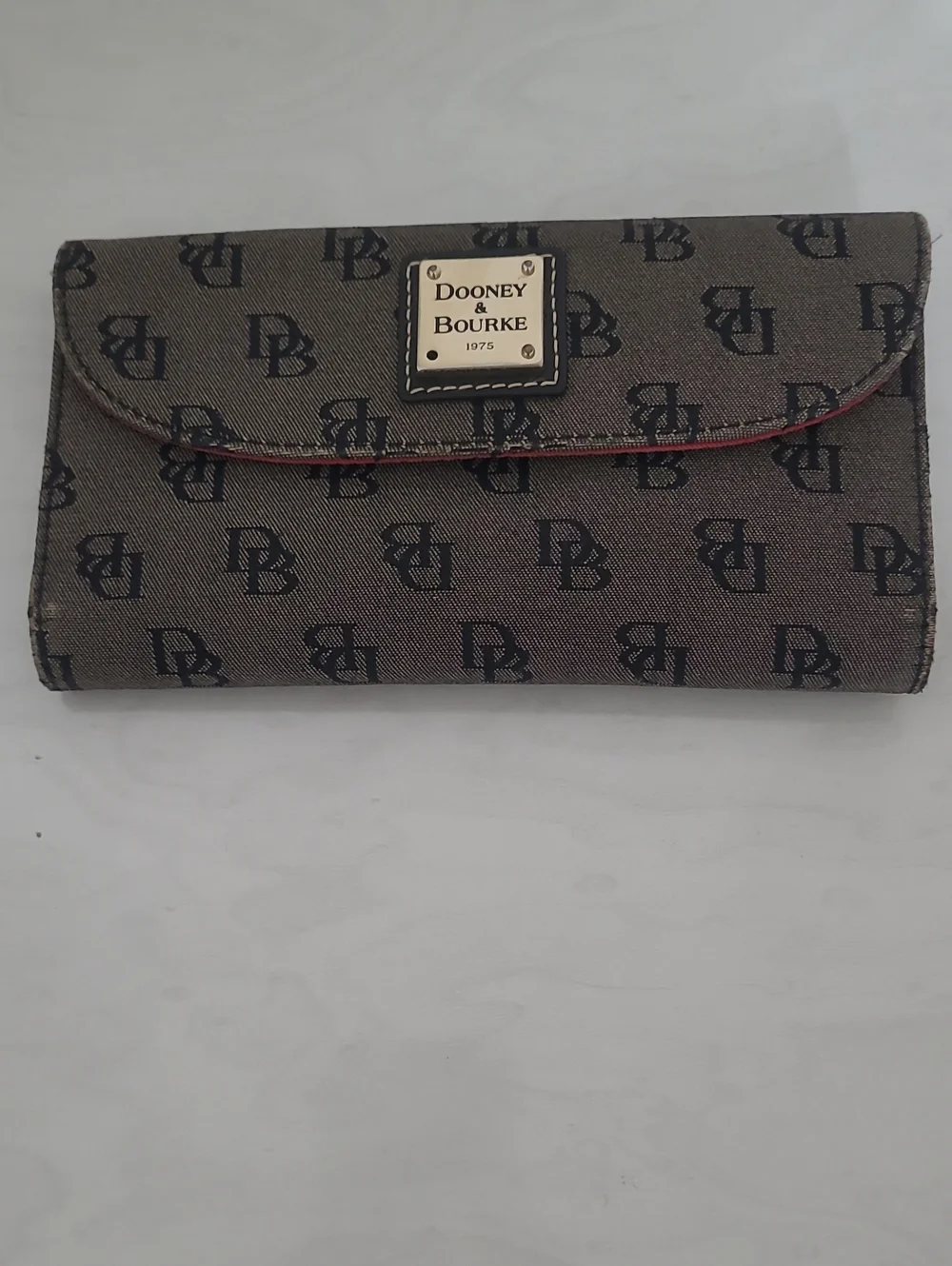 Dooney & Bourke Continental Clutch Wallet Black Looking For A New Owner.